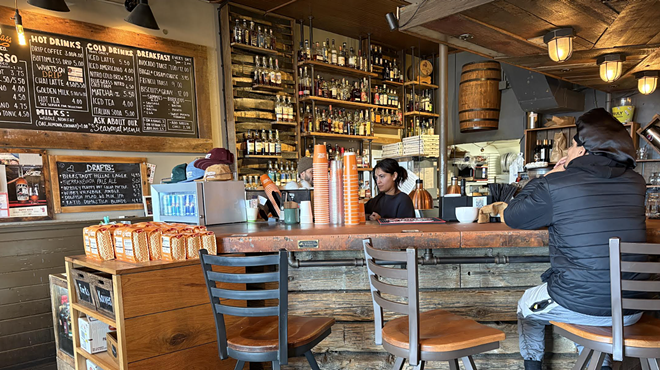 A person sitting at a bar