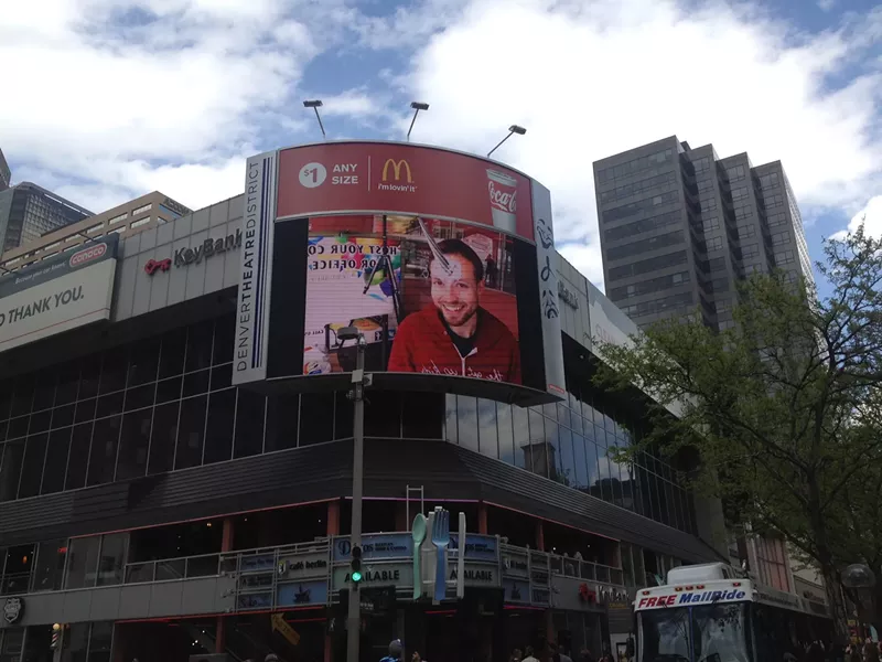 Image: David Moke testing a CU Denver student’s A/R project using the Denver Theatre District’s 16th and Champa LED screen.