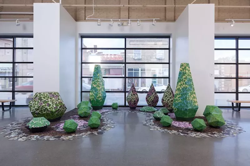 Image: Mackenzie Browning’s paper garden installation, “Barrier Green,” at the Center for Visual Art, MSUD.