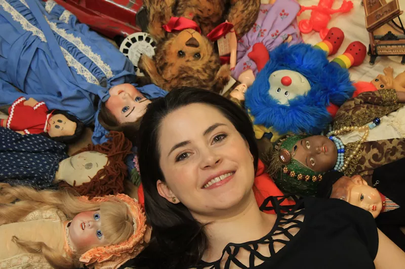 Image: Wendy Littlepage, director of the Denver Museum of Miniatures, Dolls and Toys, poses with part of the collection.