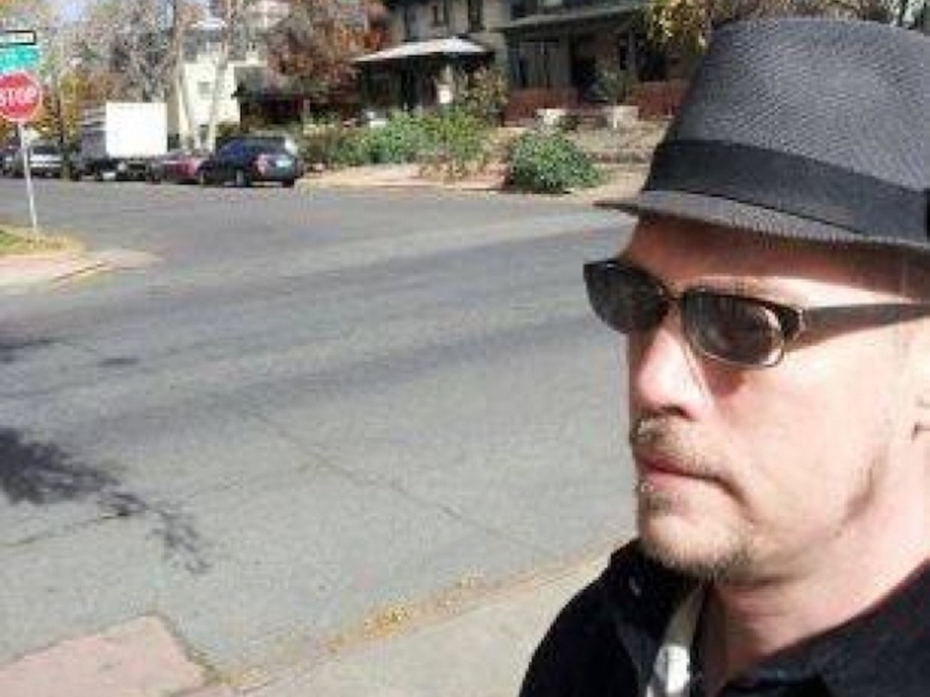 Poet and writer Zack Kopp walks the street of Denver.