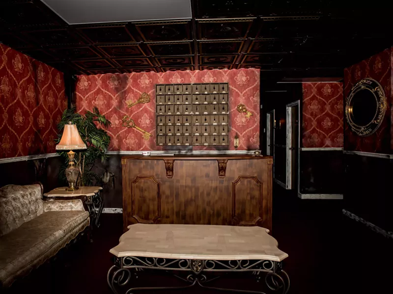 Image: Tim Carrillo, owner of 303 Escape, spent six months converting a space into a rundown hotel for his horror themed escape room "Homicide Hotel."