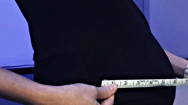 Image: 9News's Becky Ditchfield showing how her baby measures up.