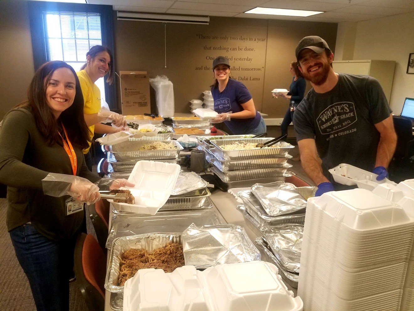 Wayne's Smoke Shack employees box up food for National Jewish Health in Denver.