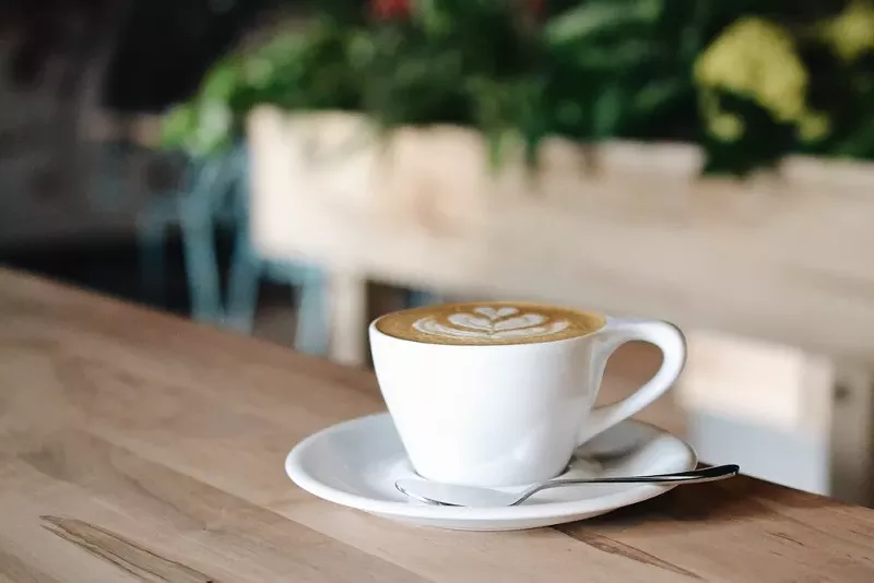 Image: A cup of Unravel coffee served at its new Virginia Village cafe.