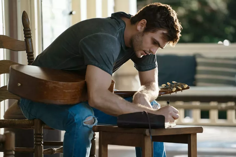 Image: Alex Roe plays Liam Page, a country boy from Louisiana who becomes a bona fide country star after putting his marriage on hold, then returns home for a couple of showdowns in Forever My Girl.