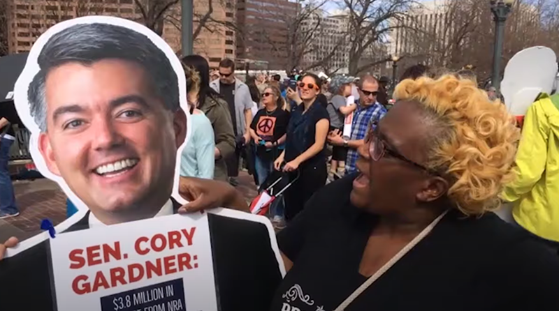 Image: Cardboard Cory Gardner in action.
