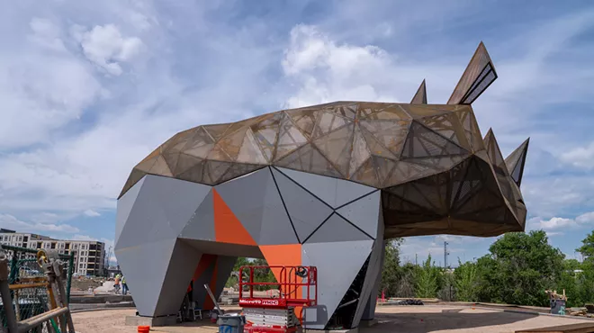 A progress photo of a sculpture being installed