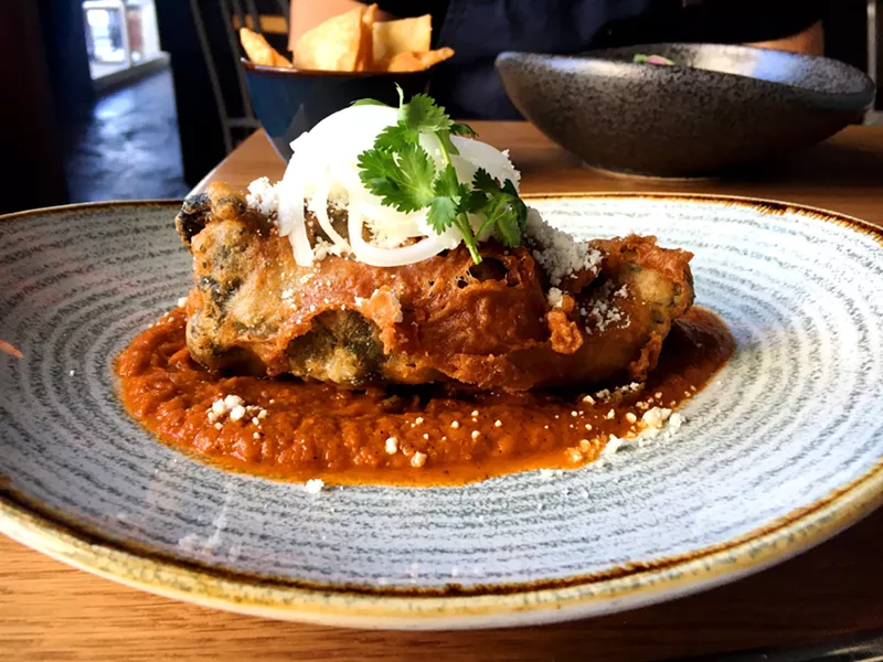 Image: Bellota's chile relleno uses tempura-style batter for an extra-crunchy bite.