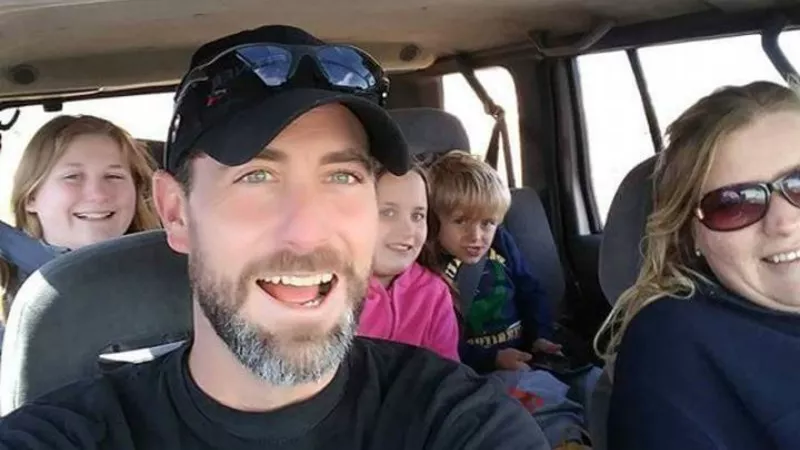 Image: The late Adam Lee with wife Erika and his three youngest kids.