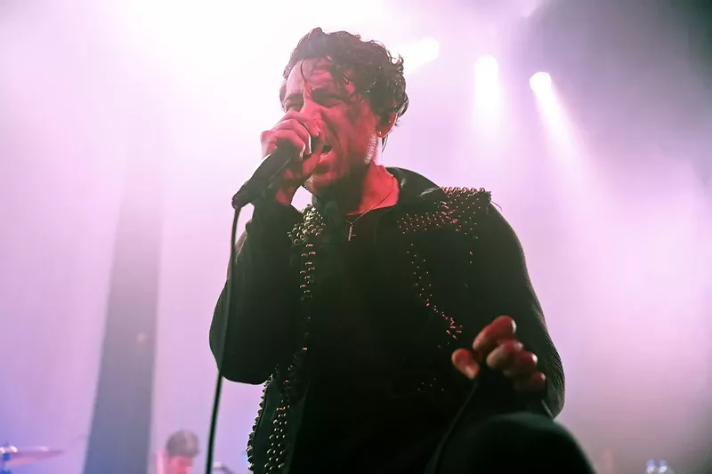 Image: Davey Havok, lead singer of AFI, belts it out at the Gothic Theatre on January 28, 2017.