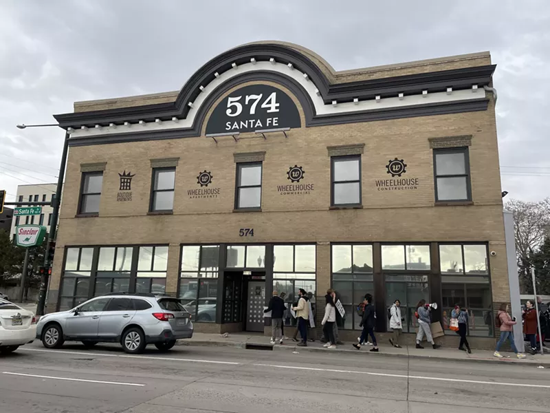 Image: The Clarkson tenants picketing in front of Boutique Apartments in Denver, Colorado, on April 19.