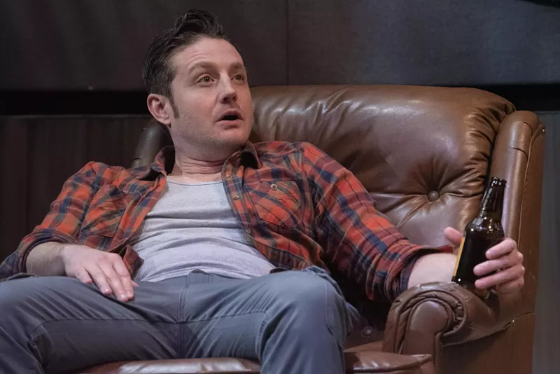 Image: Jeff, as played by Sean Scrutchins, lounges in his chair as he chats with his buddies.