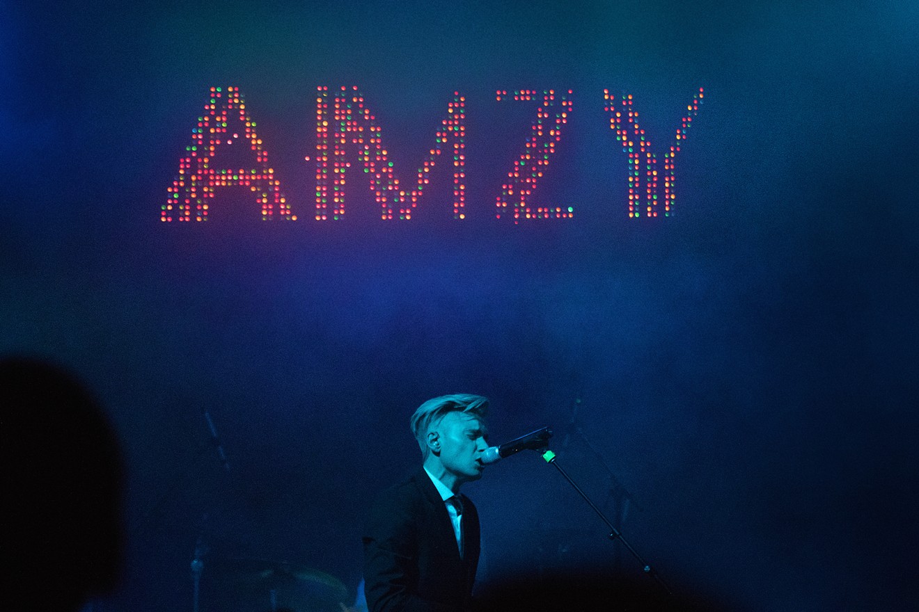 Johnson on stage during an AMZY concert.