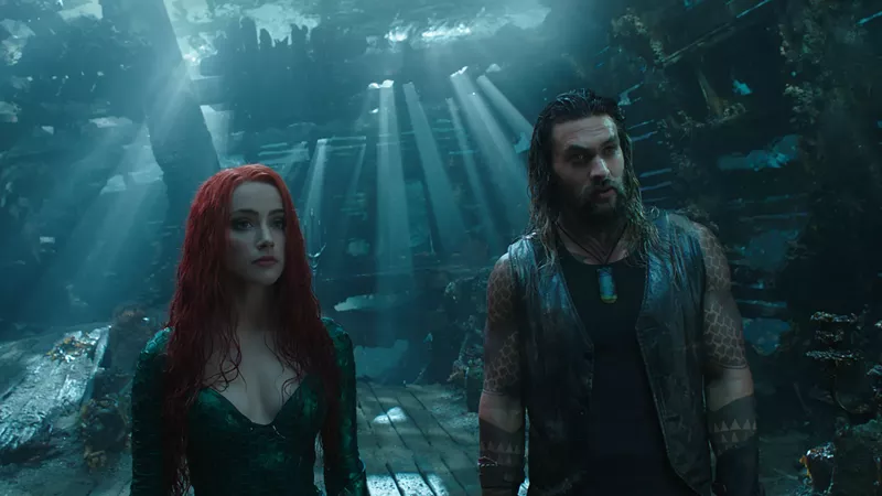 Image: Jason Momoa (right) plays Aquaman, a hard-drinking surface-dweller townie raised in a Massachusetts lighthouse, and Amber Heard is Atlantean battle-mermaid Mera in James Wan’s superhero epic.