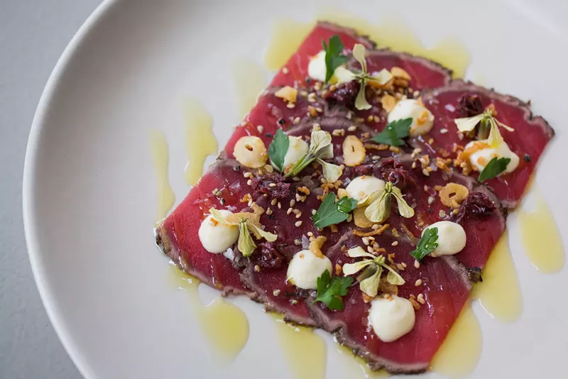 Image: The black and blue elk plate at Arcana.