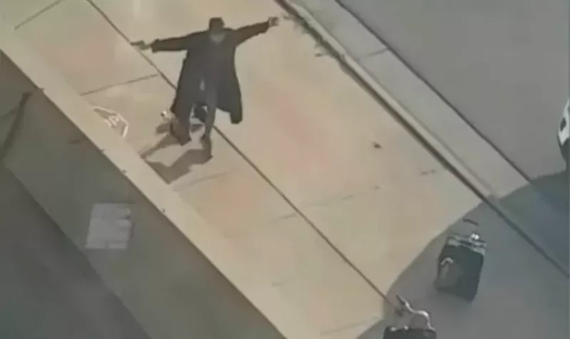 Image: A screen capture from a video showing the July 1 fatal shooting in Denver of 22-year-old Christopher Barela.