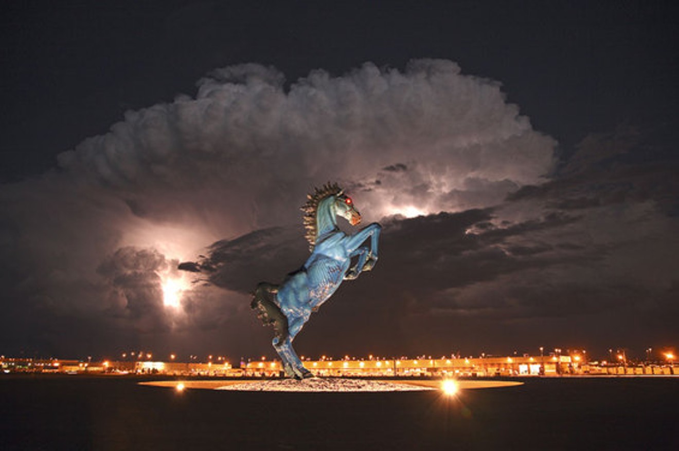 The blue devil horse stands outside Denver International Airport.