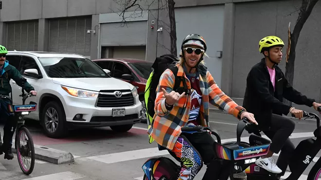 Pat Milbery rides a bike.