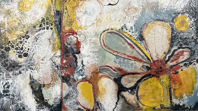 A colorful abstract painting of flowers
