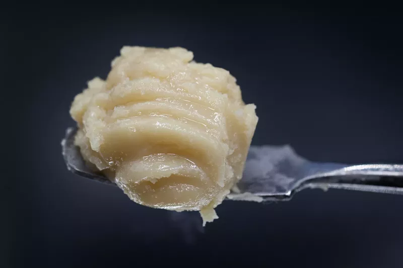 Image: Sugar is high-quality concentrate that looks like a glob of brown sugar, with sticky, crystallized THC.