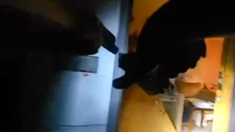 Image: A screen capture from body-camera footage seconds after the shooting of homeowner Richard Gary Black.