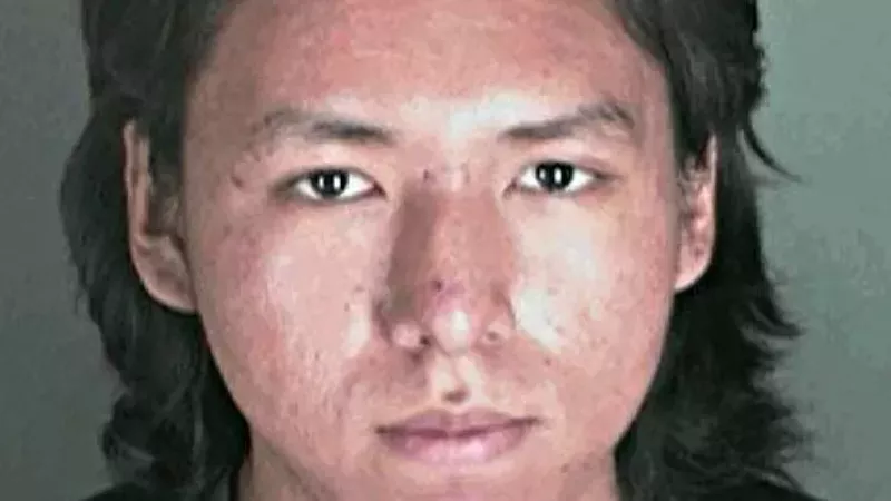 Image: A 2013 booking photo of Alec Arapahoe.