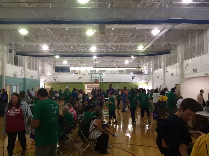 Image: The crowded gym at the Aurora Homeless Connect one-day fair.