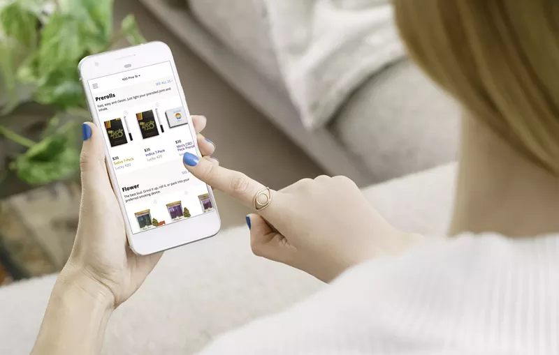 Image: An online shopper browses Eaze, a marijuana delivery app.