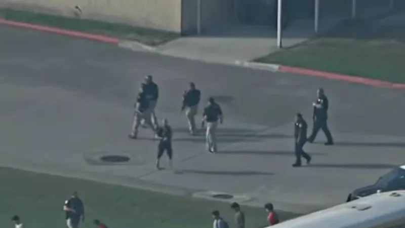 Image: Officers responding to the May 18 shooting at Santa Fe High School in Santa Fe, Texas.