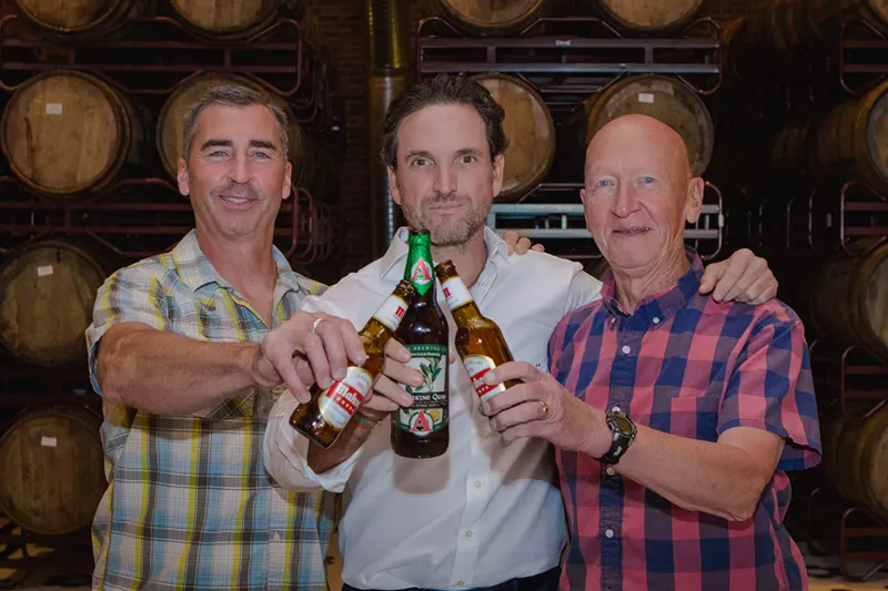 Image: Adam Avery (left), Eduardo Petrossi and Larry Avery toast the deal.