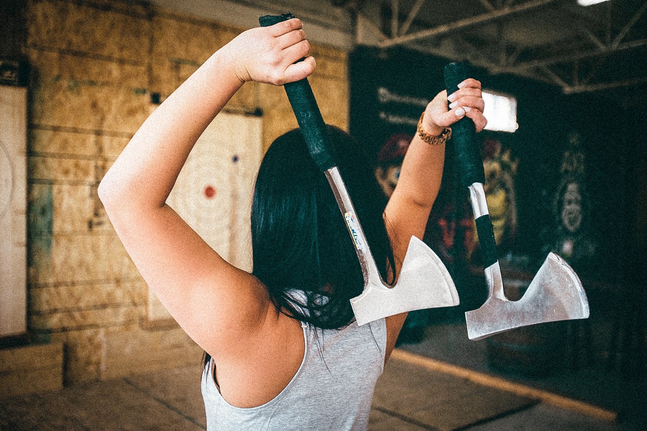 Let out some pent-up aggression on a piece of wood at Bad Axe Throwing.