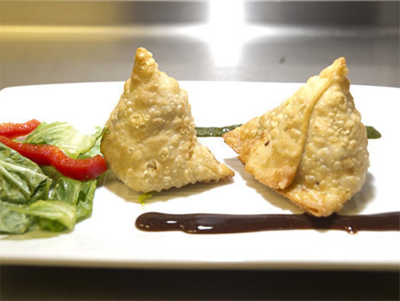 The vegan samosas are filled with mostly lentil and potato.