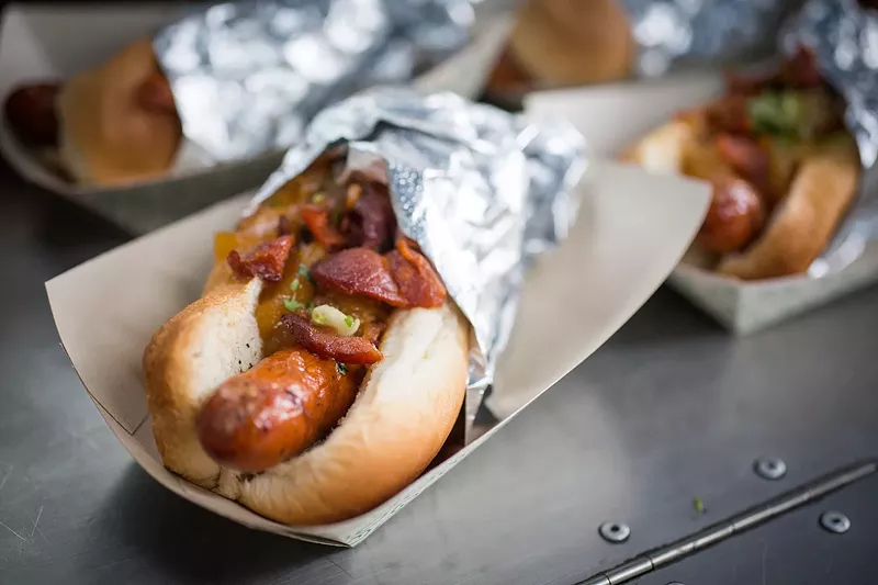 Image: a hot dog wrapped in foil
