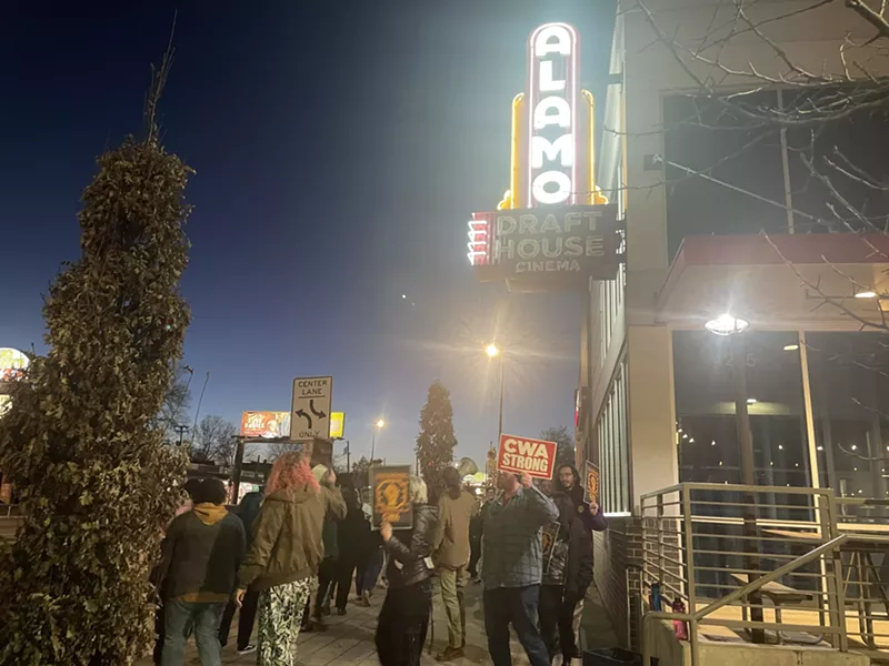 Image: A crowd of people outside of Alamo Drafthouse.