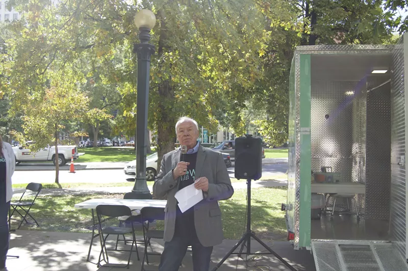 Image: Bayaud Enterprises Executive Director David Henninger introduces the shower truck, to his right.
