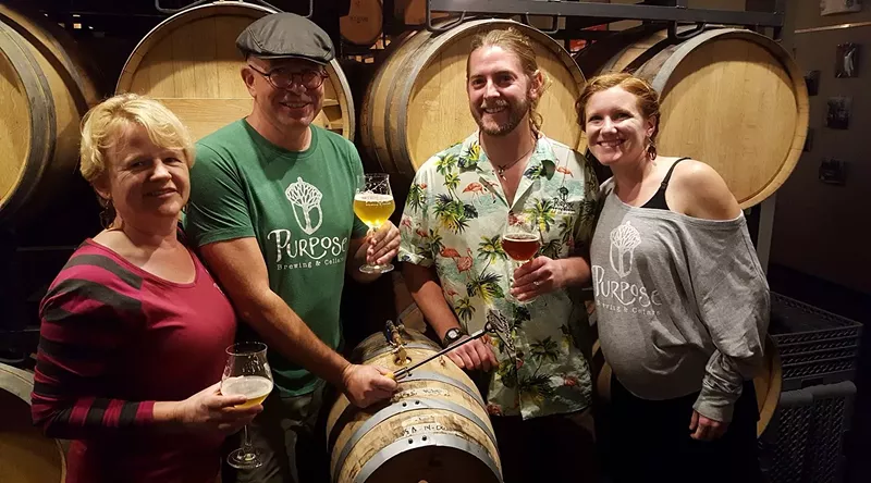Image: Zach and Laura Wilson (right) are leaving Purpose Brewing in the hands of Peter and Frezi Bouckaert.