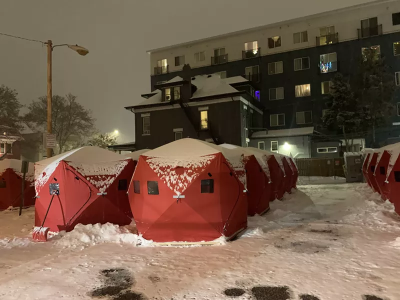 Image: A night in a tent in downtown Denver is no day at the beach.
