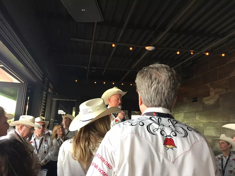 Image: Founder Larry Mizel addresses the Denver Rustlers.