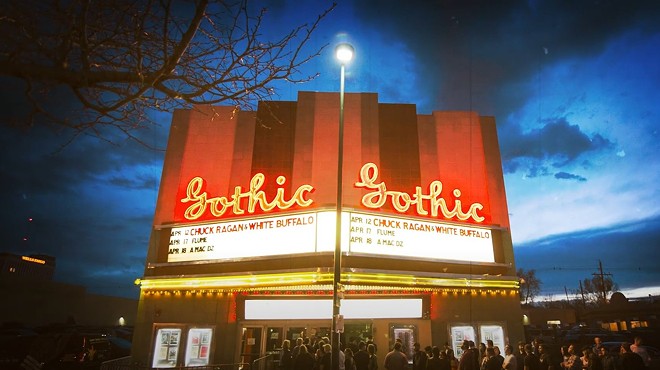 exterior of a brick venue that has the words gothic theatre