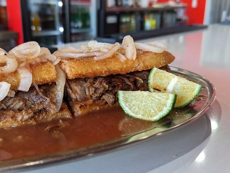 Image: a torta sandwich on a silver plate