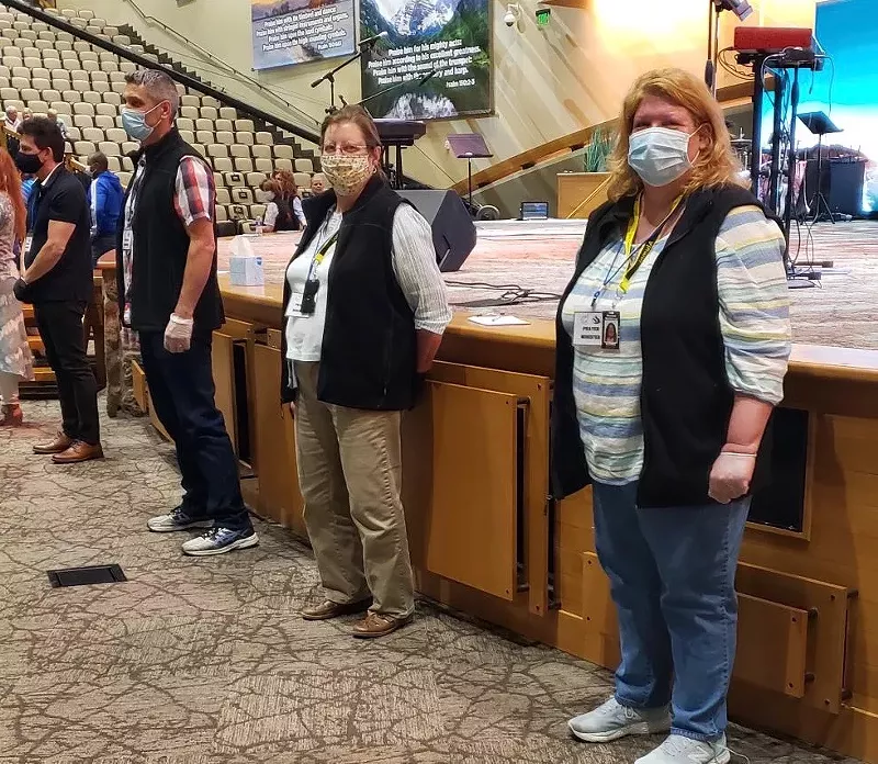 Image: People practicing social distancing at the 800-person Bible conference held by Andrew Wommack Ministries.