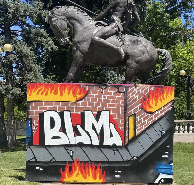 Image: A mural painted by Speaks that is part of the Black Love Mural Festival in Civic Center Park.