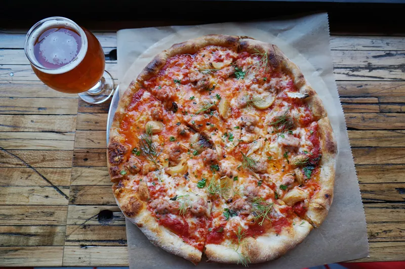 Image: The beer has always been made here, but now the pizza is, too. The Johnny (named after Johnny Cash) is made with red-ale sausage, fennel and roasted garlic.