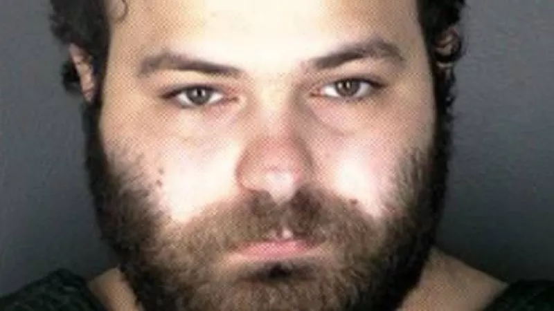 Image: The booking photo for accused Boulder King Soopers shooter Ahmad Al Aliwi Alissa.