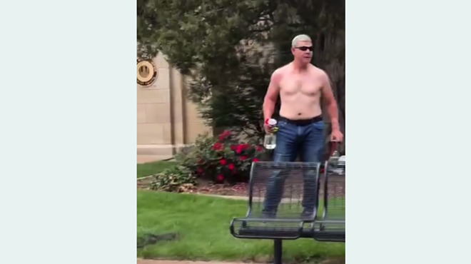 Boulder fire attacker stands wihtout shirt on