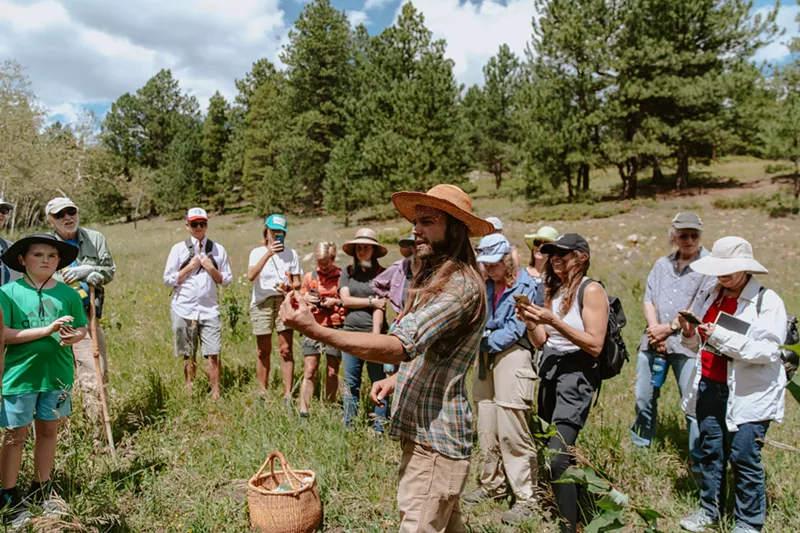 Image: A Colorado field guides identifies a local mushroom in Boulder County.