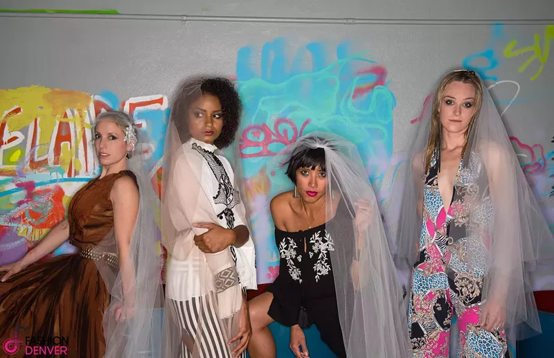 Image: Fashion Denver's Brandi Shigley (in black) poses with models.