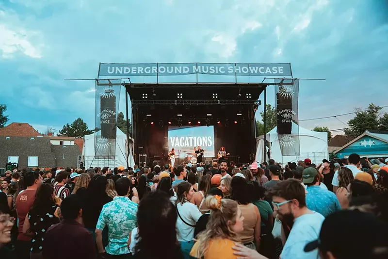 Image: a stage at the underground music showcase in Denver