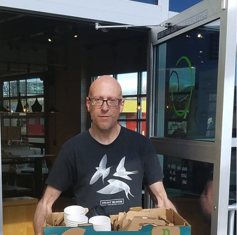 Image: Troy Reynolds prepares coffee for delivery to a local hospital.
